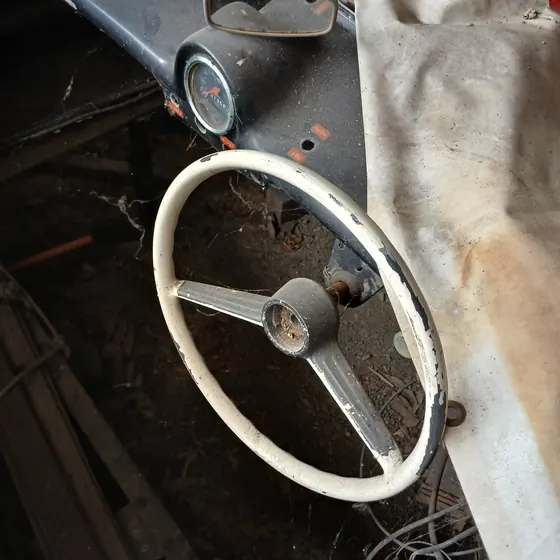 Cream steering wheel and speedometer of the c1960 Goggomobil Dart
