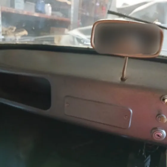 Painted dashboard, parcel shelf and rear-view mirror of the c1958 Goggomobil T300 sedan